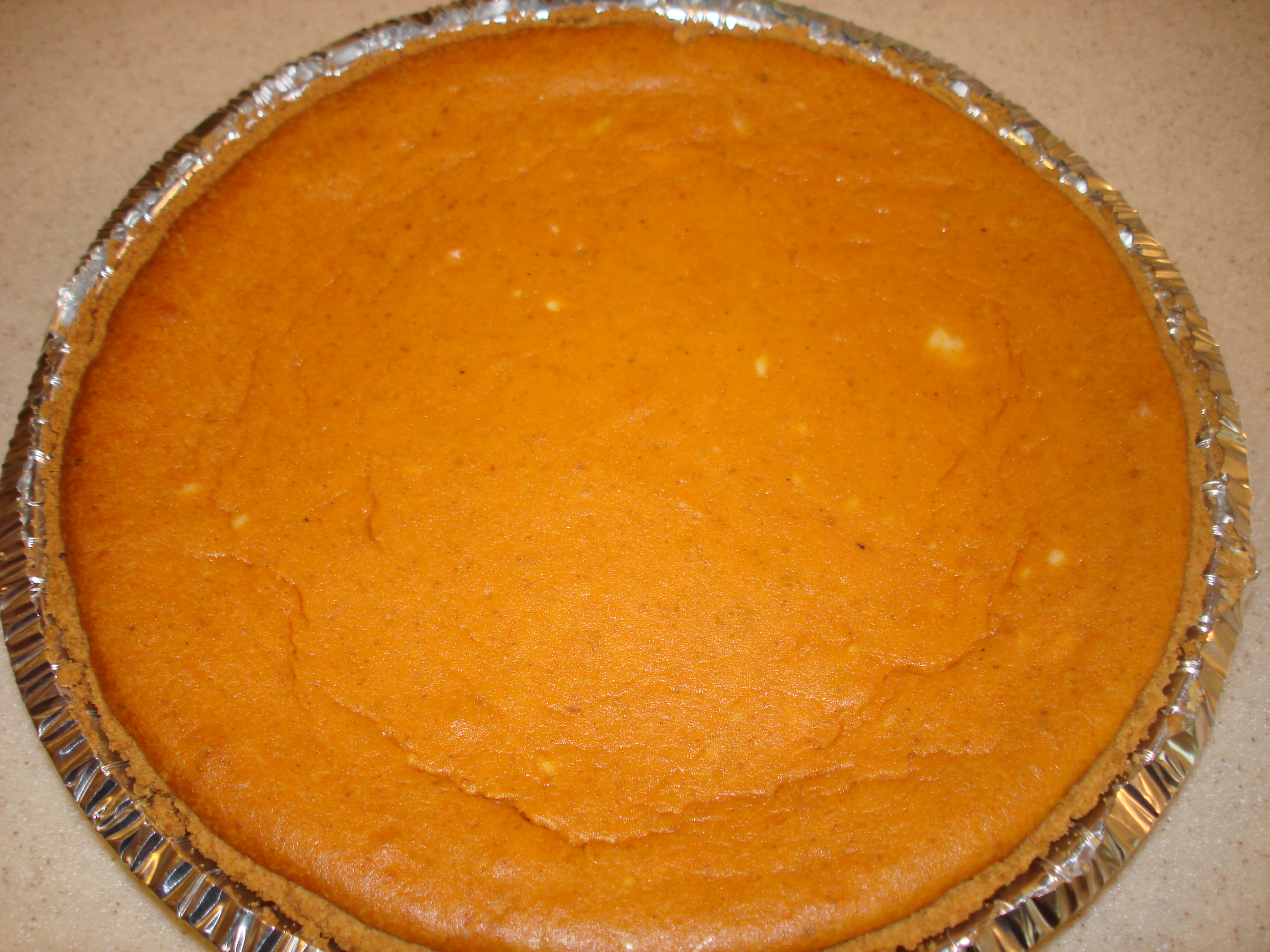 A foodie recipe for making an easy Thanksgiving Pumpkin cheesecake dessert.