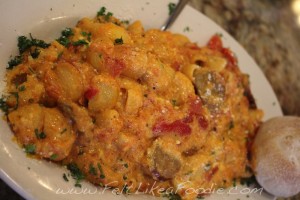 Lumache Arrosto: Shell shaped pasta with San Marzano tomato sauce, ricotta cheese, roasted red peppers, and grilled Italian sausage. YUM!!!