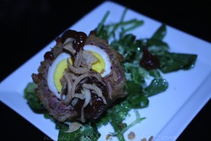 Black Team: "Son in law" Egg, tamarind chili sauce, crispy shallots and peppery greens